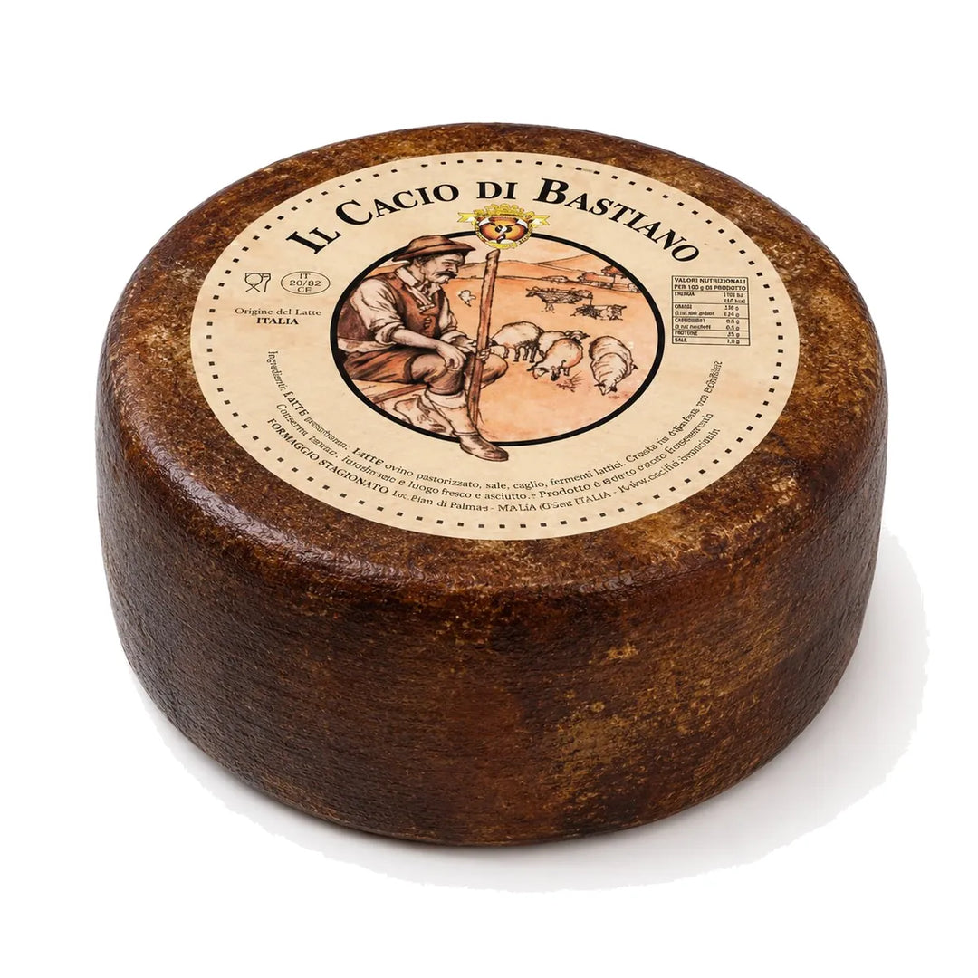Cacio di Bastiano Caseificio Follonica forma intera 2,7 kg con crosta marrone uniforme, formaggio toscano misto vaccino e ovino stagionato 60-70 giorni, B2B HoReCa Salumeria Toscana