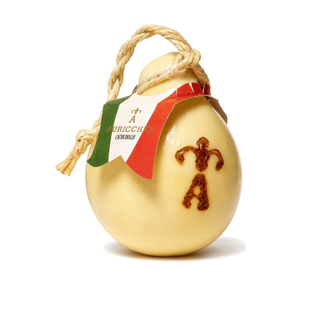 Caciocavallo Auricchio forma intera 1,3 kg con timbro a fuoco e cordicella, vista frontale, pezzatura B2B HoReCa fornitore Salumeria Toscana